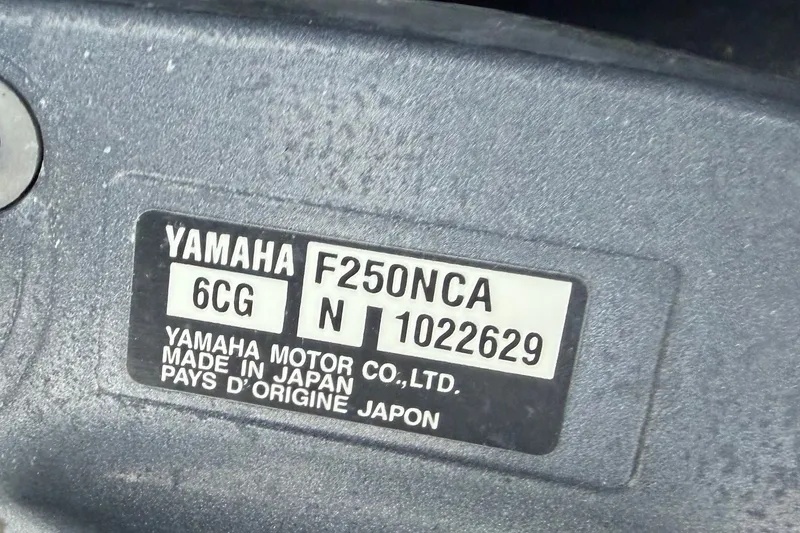 Slide: The Image of Yamaha F250NCA engine label on Ocean Runner 27, year 2000, made in Japan. - 37
