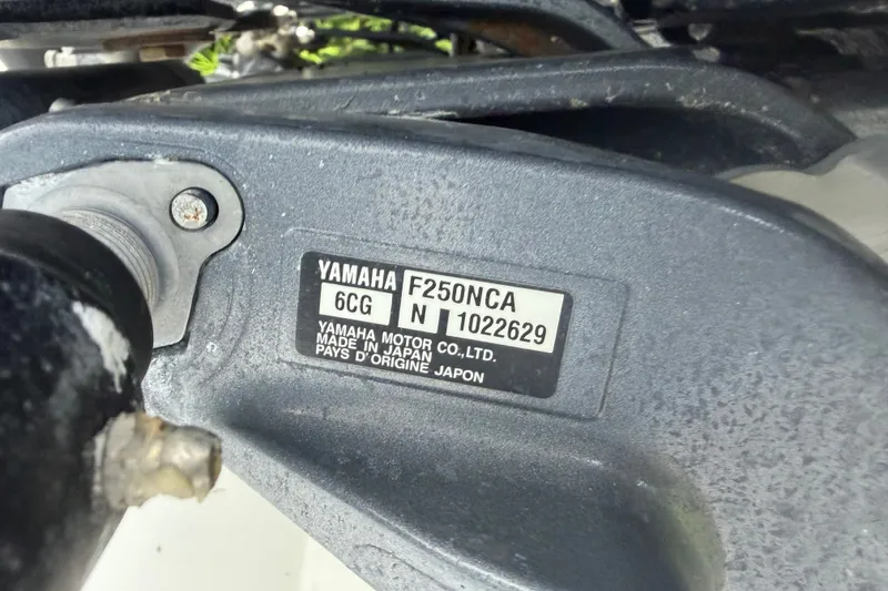 Slide: The Image of Yamaha F250NCA engine label on Ocean Runner 27, year 2000, made in Japan. - 28