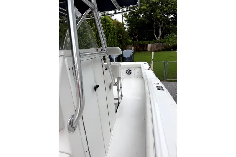 Slide: The Image of 2000 Ocean Runner 27 boat interior with sleek design and stainless steel railings. - 15