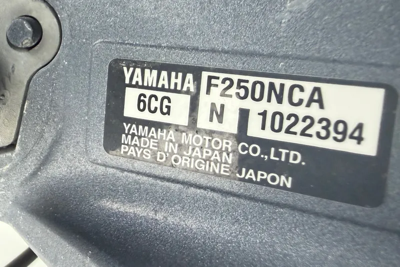 Slide: The Image of Yamaha F250NCA engine label on a 2000 Ocean Runner 27 boat. - 36