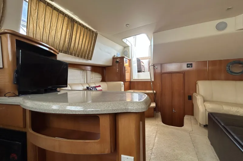 Slide: The Image of Interior of 2002 Carver 366 Motor Yacht with cozy seating and modern amenities. - 40