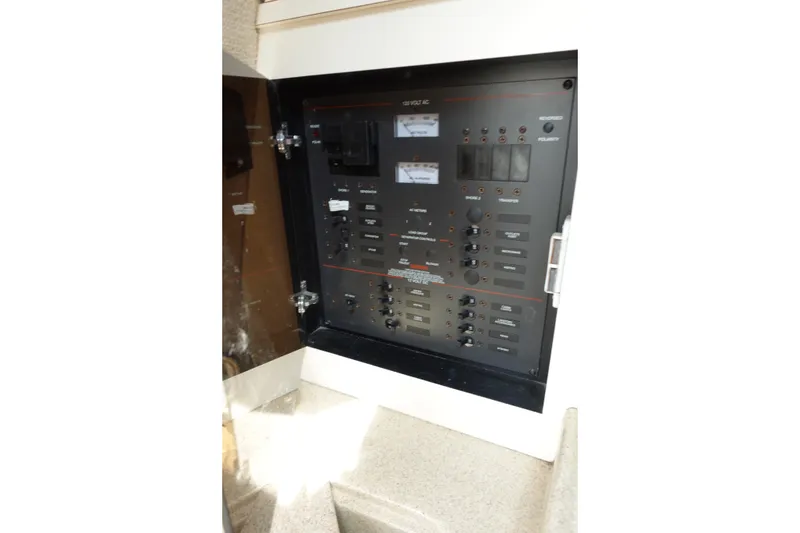 Slide: The Image of Electrical control panel inside 2004 Grady-White Tournament 275 boat cabin. - 21