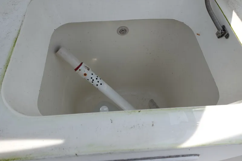 Slide: The Image of Livewell compartment on a 2004 Grady-White Tournament 275 boat. - 16