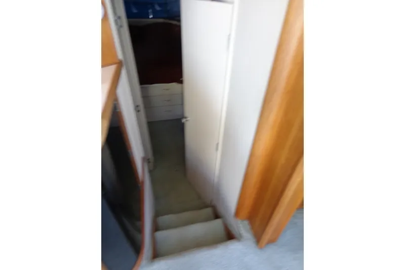 Slide: The Image of Interior view of 1989 Tollycraft 34 Sport Sedan, showing stairs and cabin entrance. - 17