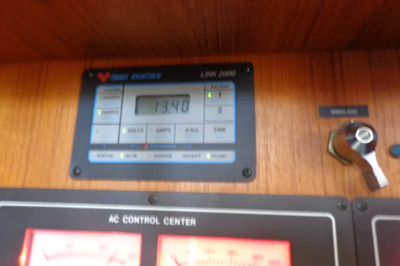 Slide: The Image of Control panel of a 1989 Tollycraft 34 Sport Sedan with voltage display. - 19