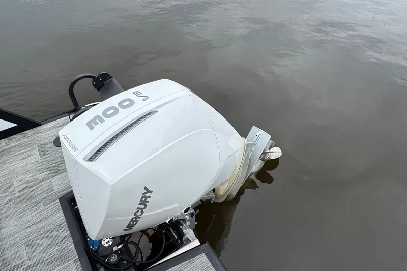 Slide: The Image of Mercury outboard motor on Viaggio Diamante S 26 boat, 2026 model, docked on water. - 23