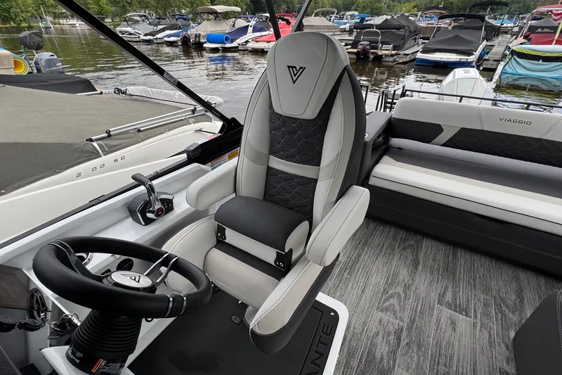 Slide: The Image of Luxurious interior of 2026 Viaggio Diamante S 26 boat with plush seating and modern controls. - 14