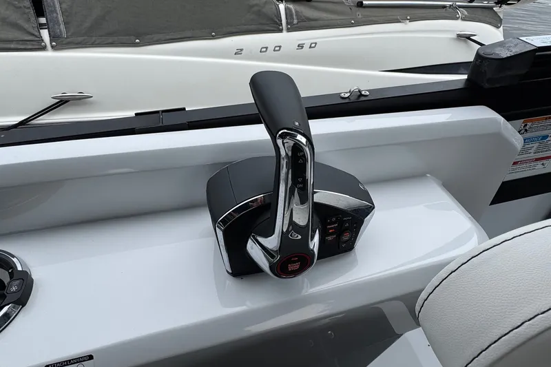 Slide: The Image of Control panel of 2026 Viaggio Diamante S 26 boat with sleek throttle lever. - 16