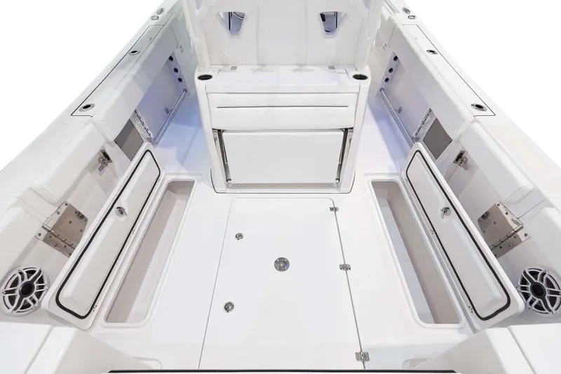 Slide: The Image of Manufacturer Provided Image: 2025 Sportsman Open 322 Center Console boat interior with spacious seating and storage compartments. - 15