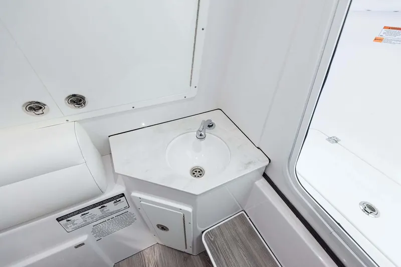 Slide: The Image of Manufacturer Provided Image: 2025 Sportsman Open 322 Center Console interior sink area with modern design. - 21