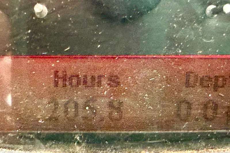 Slide: The Image of Close-up of Chaparral Sunesta 284 2008 hour meter displaying 210.5 hours. - 40