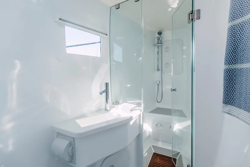 Slide: The Image of Modern bathroom with glass shower in 2024 Vision 444ES model yacht. - 27