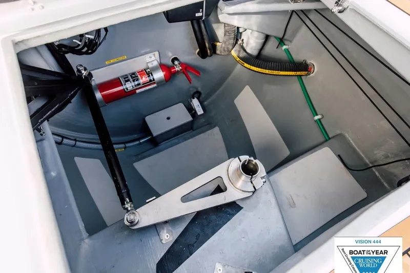Slide: The Image of Interior view of Vision 444ES 2024 boat, featuring safety equipment and mechanical components. - 32
