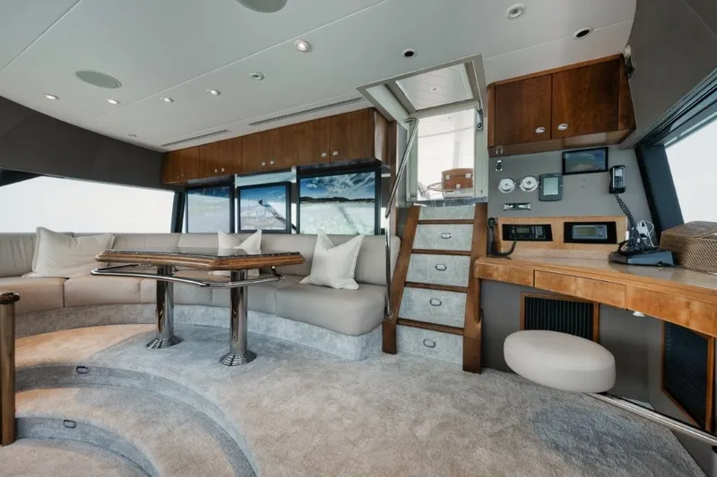 Slide: The Image of Luxurious interior of 2003 Westport 112 Raised Pilothouse yacht with plush seating and elegant decor. - 29