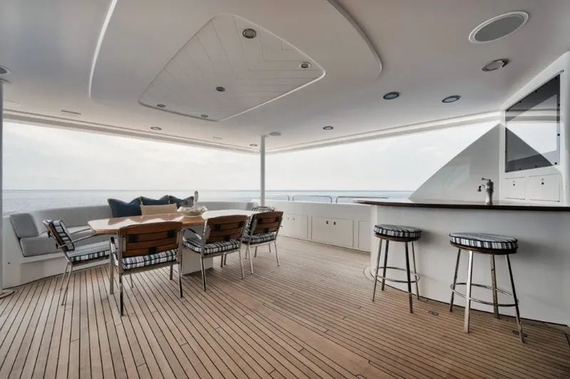 Slide: The Image of Luxurious deck of 2003 Westport 112 yacht with seating and ocean view. - 35