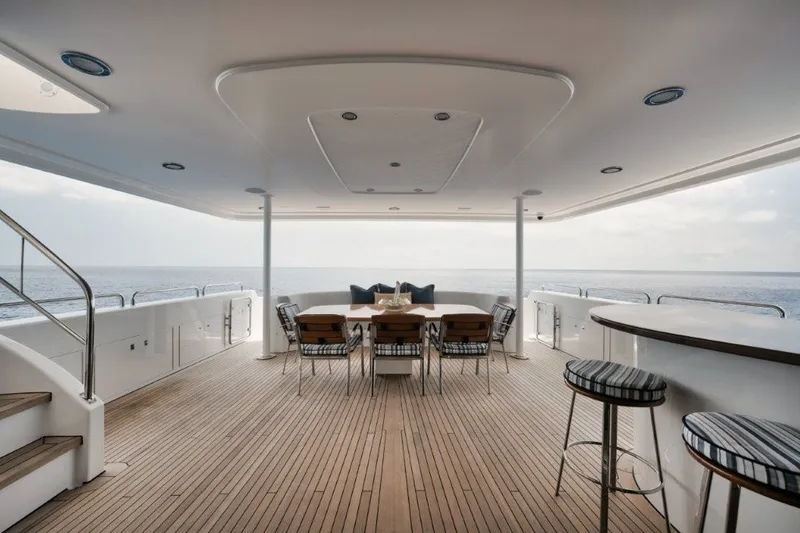 Slide: The Image of Luxurious deck of 2003 Westport 112 Raised Pilothouse yacht with ocean view. - 36