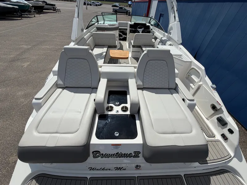 Slide: The Image of The image shows the stern of a 2025 Sea Ray SDX 290 with luxurious seating. - 10