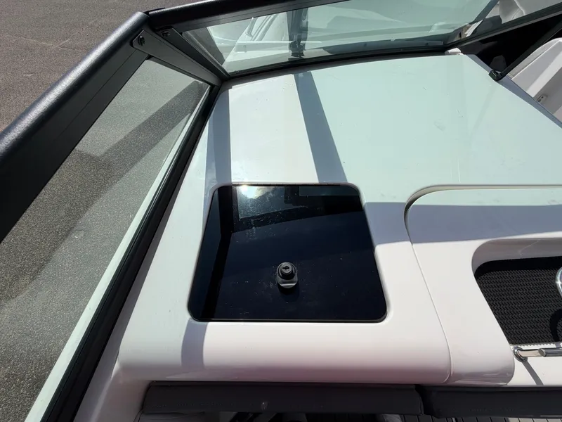Slide: The Image of The image shows the dashboard of a 2025 Sea Ray SDX 290 boat. - 31