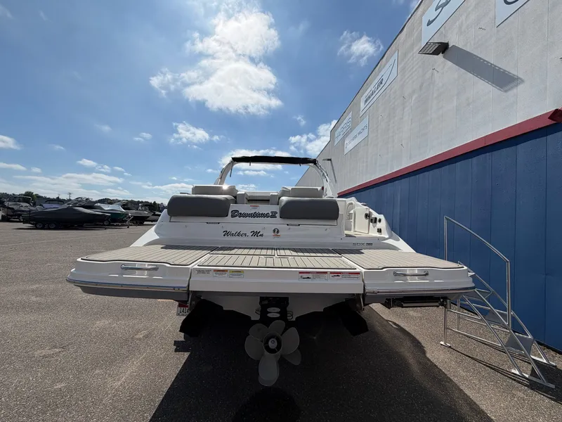 Slide: The Image of The image shows a 2025 Sea Ray SDX 290 boat in a parking area. - 5