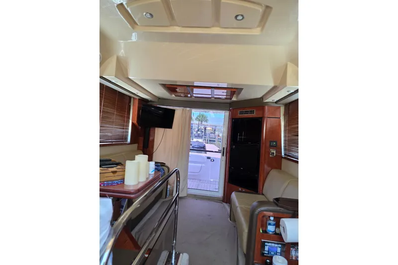 Slide: The Image of Interior of 2007 Sea Ray 36 Sedan Bridge yacht with modern amenities and elegant design. - 7