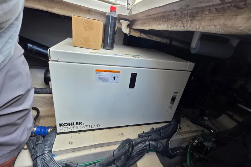 Slide: The Image of Kohler power system in 2007 Sea Ray 36 Sedan Bridge engine room. - 14