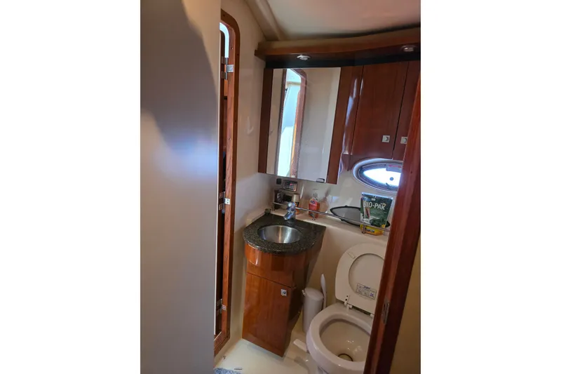 Slide: The Image of Luxurious bathroom in 2007 Sea Ray 36 Sedan Bridge yacht with modern amenities. - 13