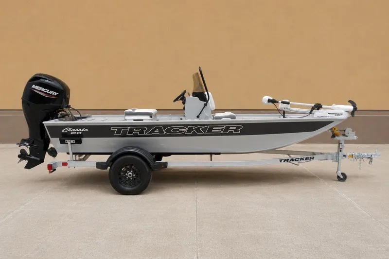 The Image of 2027 Tracker Bass Tracker Classic CC boat on trailer, side view. - 0