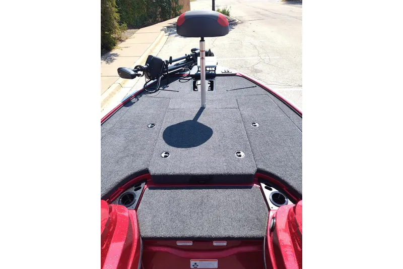 Slide: The Image of 2027 Nitro Z18 XL Pro boat deck with seating and fishing equipment. - 5