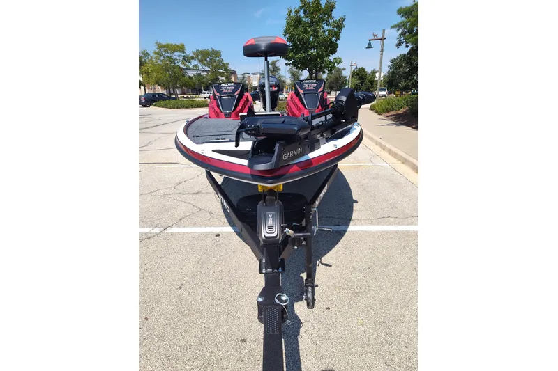 Slide: The Image of 2027 Nitro Z18 XL Pro boat with Garmin equipment in a parking lot. - 4