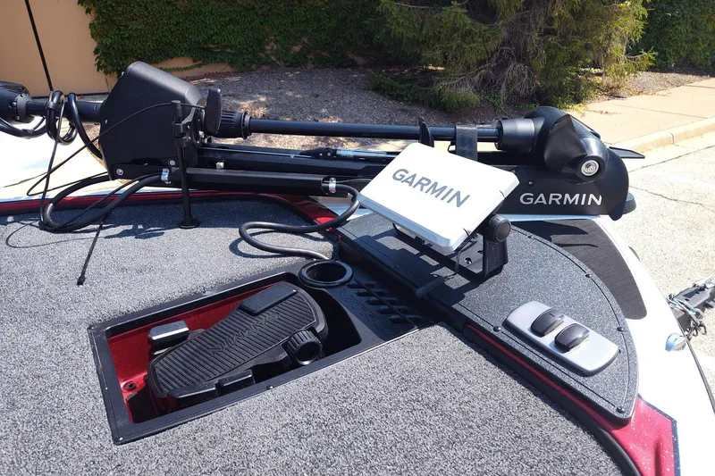 Slide: The Image of Nitro Z18 XL Pro 2027 boat deck with Garmin equipment and foot pedal controls. - 7