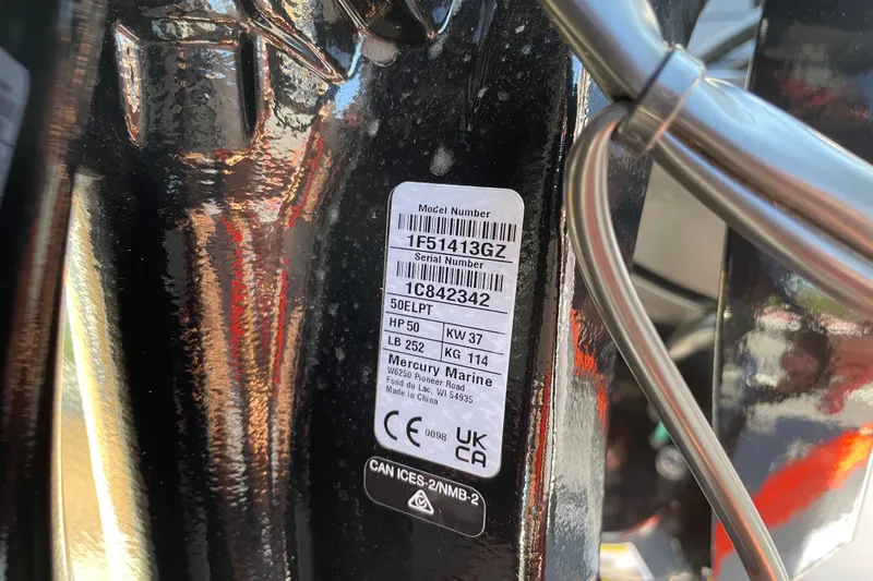 Slide: The Image of Label on Tracker Pro 170 boat engine, displaying model and serial numbers, Mercury Marine details. - 41