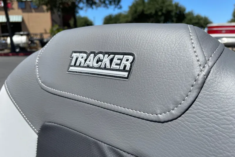 Slide: The Image of Gray leather seat with "Tracker" logo on a 2027 Pro 170 model. - 16
