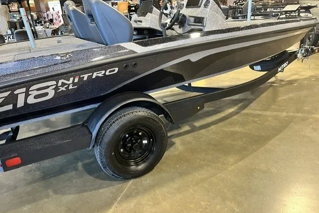 The Image of 2027 Nitro Z18 XL Pro boat on display, featuring sleek design and modern features. - 0