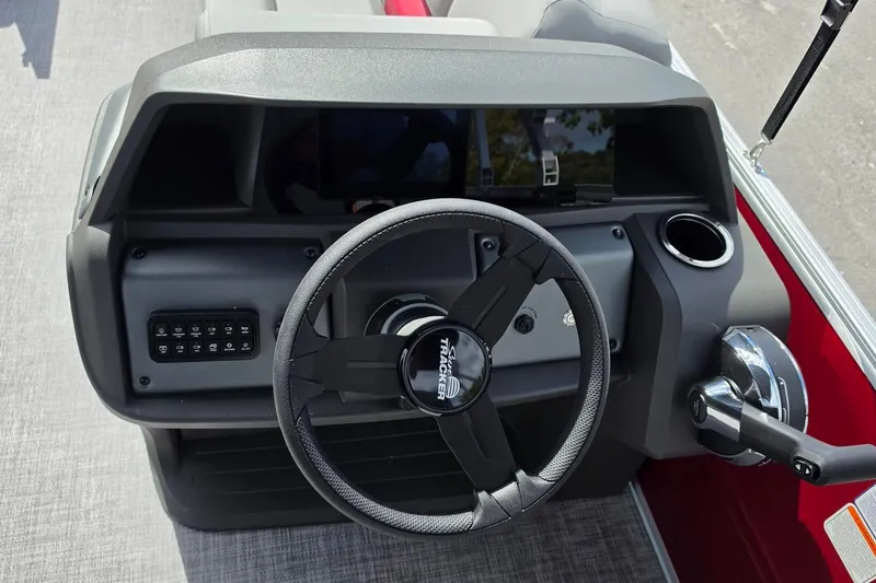 Slide: The Image of Steering console of 2027 Sun Tracker Party Barge 20 DLX pontoon boat. - 14