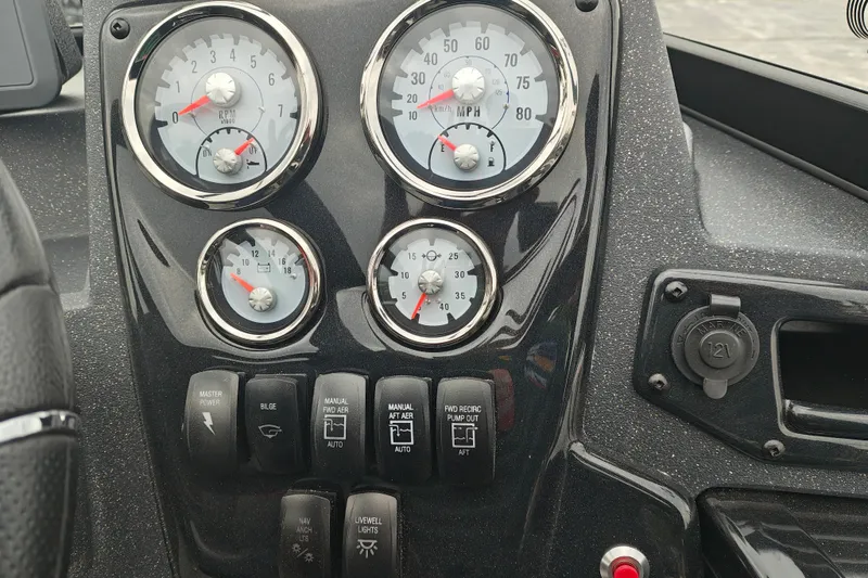 Slide: The Image of Dashboard of 2026 Tracker Targa V-19 WT boat with gauges and controls. - 15
