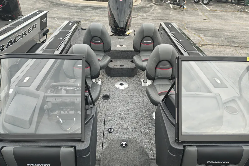 Slide: The Image of 2026 Tracker Targa V-19 WT boat interior with seating and steering console. - 35