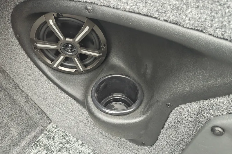 Slide: The Image of Speaker and cup holder in 2026 Tracker Targa V-19 WT boat interior. - 17