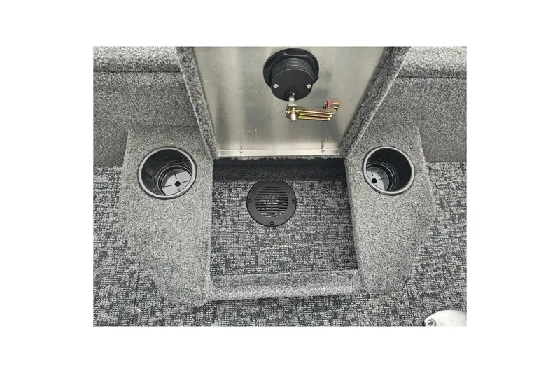 Slide: The Image of Interior of 2026 Tracker Targa V-19 WT boat with cup holders and carpeted flooring. - 40