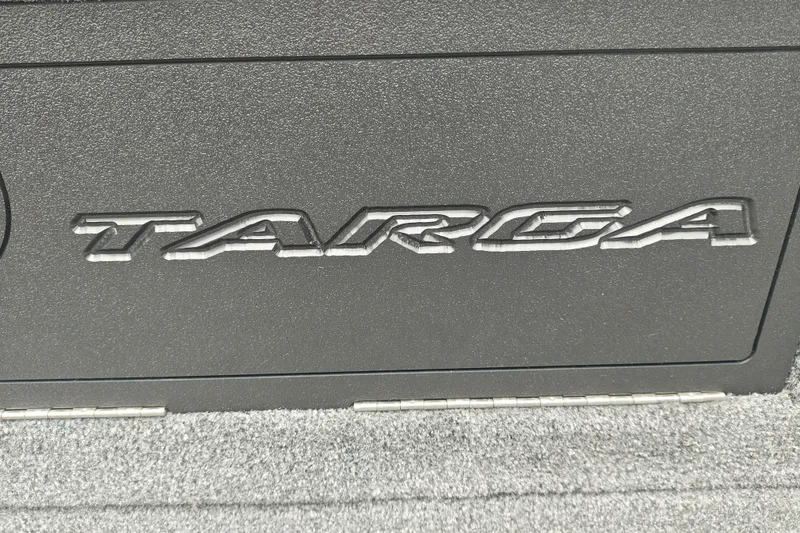 Slide: The Image of 2026 Tracker Targa V-19 WT logo on textured surface. - 23