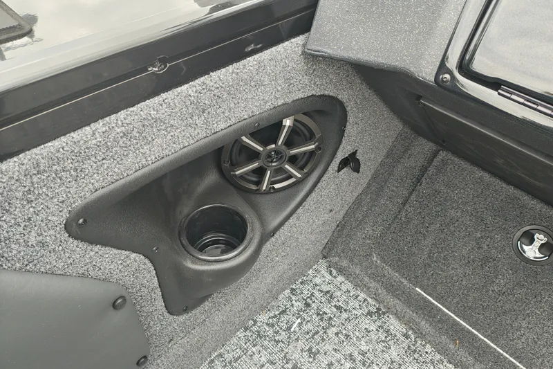 Slide: The Image of Interior of 2026 Tracker Targa V-19 WT boat with speaker and cup holder. - 26