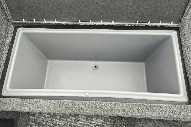 Slide: The Image of Empty storage compartment in 2026 Tracker Targa V-19 WT boat. - 43
