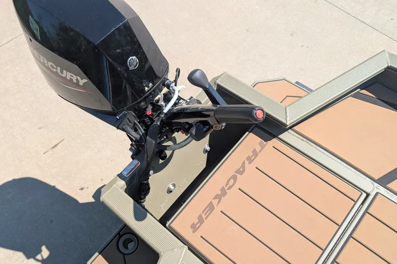 Slide: The Image of 2027 Tracker Grizzly 1553 Timber boat with Mercury outboard motor, viewed from above. - 15