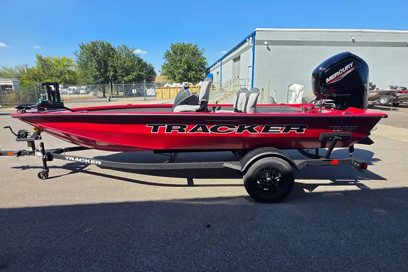 The Image of 2027 Tracker Pro Team 175 Crappie Edition boat in vibrant red on trailer. - 0