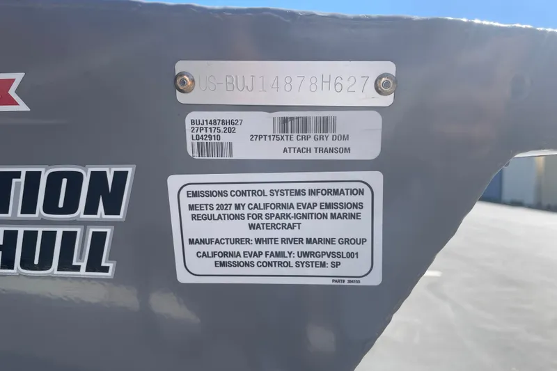 Slide: The Image of Tracker Pro Team 175 boat, 2027 model, emissions control information label visible. - 54
