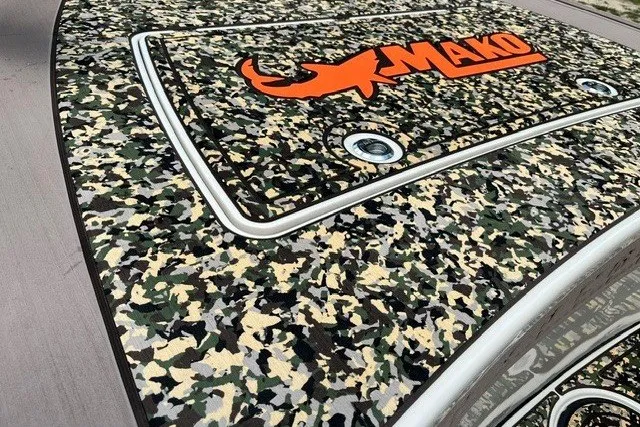Slide: The Image of 2026 Mako 18 Pro Skiff Backwater Edition with camouflage design and logo. - 16