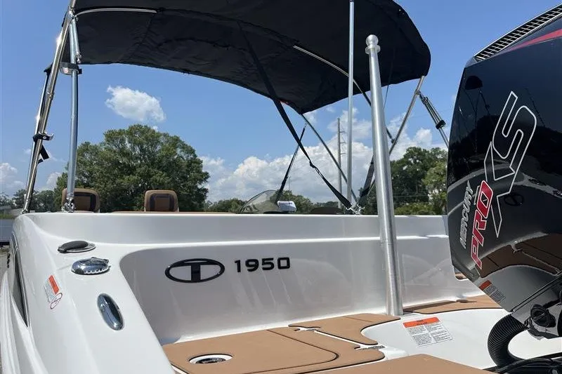 Slide: The Image of 2026 Tahoe 1950 boat with canopy and Mercury Pro XS engine. - 9