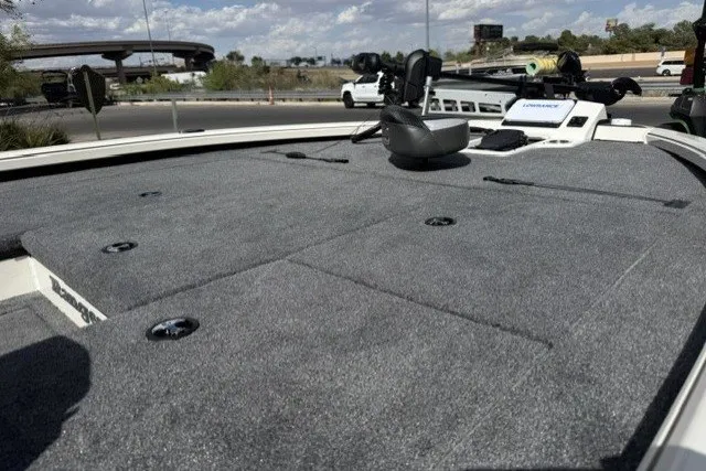 Slide: The Image of 2026 Ranger ALPHA 208 boat deck with carpeted surface and mounted equipment. - 8