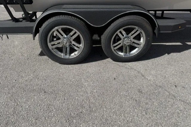 Slide: The Image of Trailer wheels of a 2026 Ranger ALPHA 208 on asphalt surface. - 4