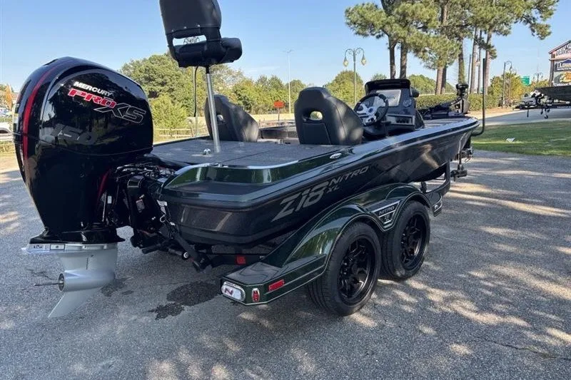 The Image of 2027 Nitro Z18 XL Pro boat with Mercury Pro XS engine, parked outdoors. - 0