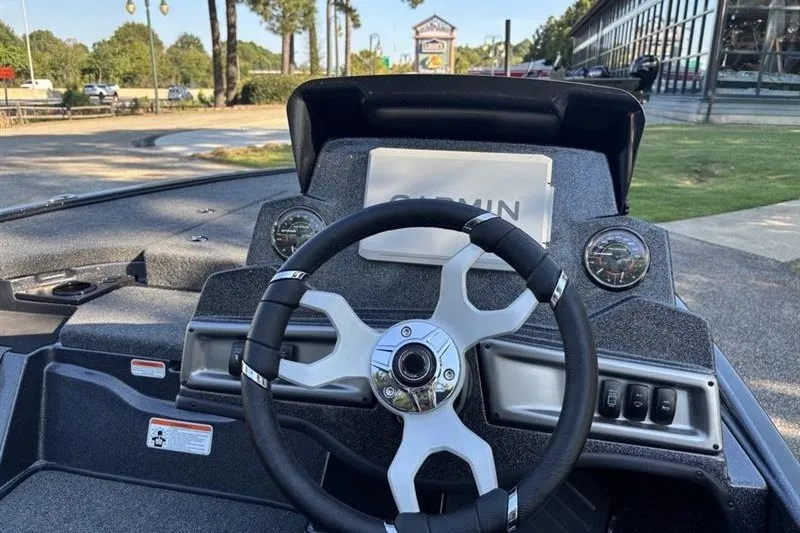 Slide: The Image of Steering console of 2027 Nitro Z18 XL Pro boat with Garmin display and gauges. - 17